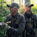 TETRA AmpPods hearing amplifiers in ears of turkey hunter with son